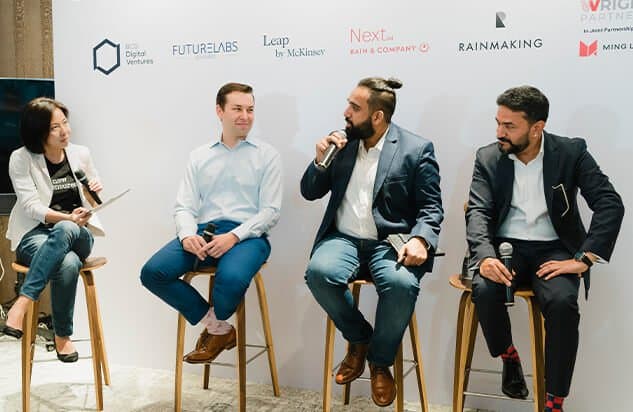 Panel of four professionals engaged in discussion