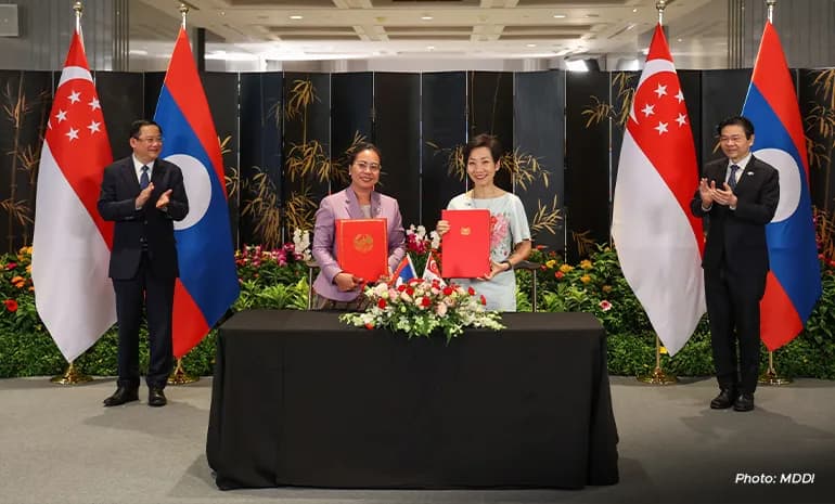 singapore laos ink pacts on education carbon credits content 1