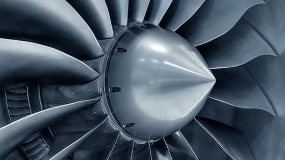 Close-up of a jet engine turbine fan blades