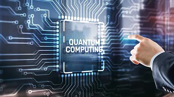 Hand touching a digital quantum computing chip graphic