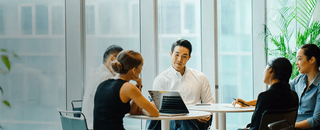 Business professionals in a team meeting at an office