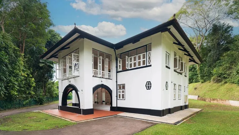 A stately colonial mansion within the Botanic Gardens