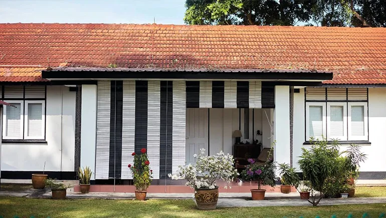 A stately colonial mansion within the Botanic Gardens