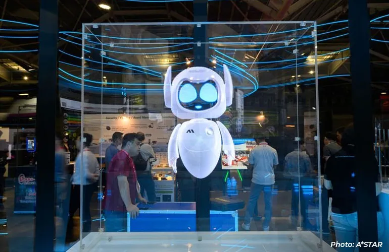 A humanoid robot displayed inside a glass enclosure at an exhibition, with visitors observing in the background.
