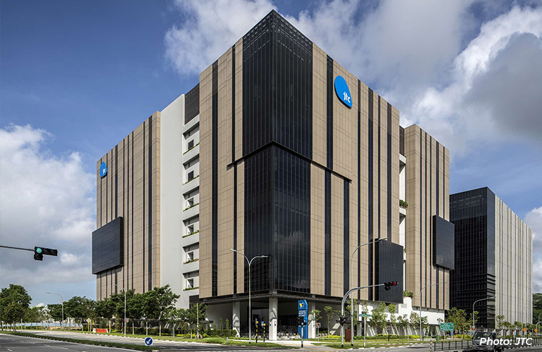 Exterior view of a modern JTC industrial facility in Singapore, featuring a multi-storey business park designed to support advanced manufacturing and technology operations.
