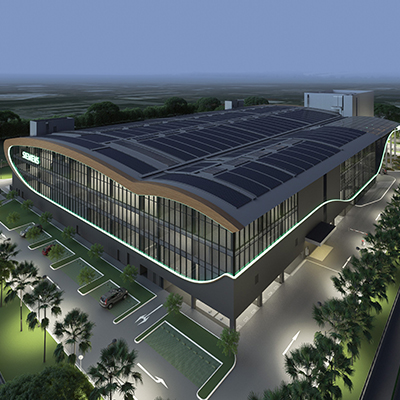 Architectural rendering of a modern Siemens industrial facility featuring rooftop solar panels, energy-efficient design elements, and landscaped surroundings, highlighting sustainable manufacturing and green infrastructure.