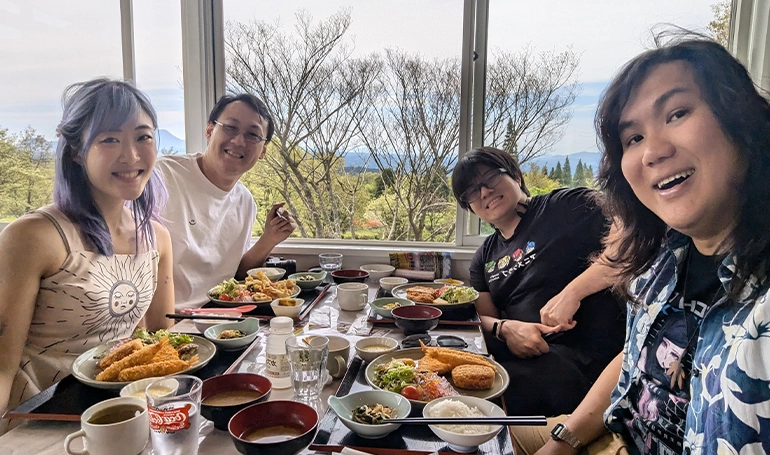 Xinni and her Singaporean friends sharing a meal in Japan.