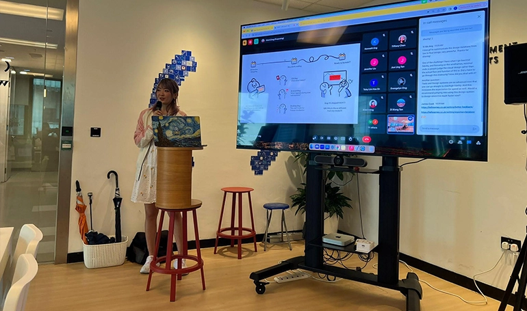 Xinni delivering a talk at OpenGov.