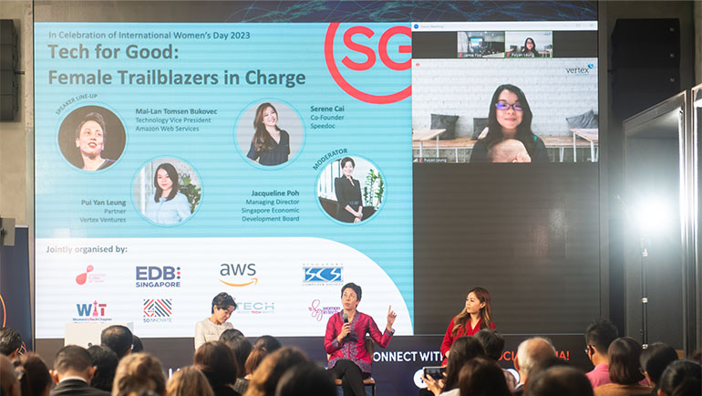 Caption: (From Left; in person) Jacqueline Poh, Managing Director, EDB; Mai-Lan Tomsen Bukovec, Vice President of Technology, AWS; and Serene Cai, Co-Founder, Speedoc; Puiyan Leung, Partner, Vertex Ventures Southeast Asia and India (seen on screen; top right).
