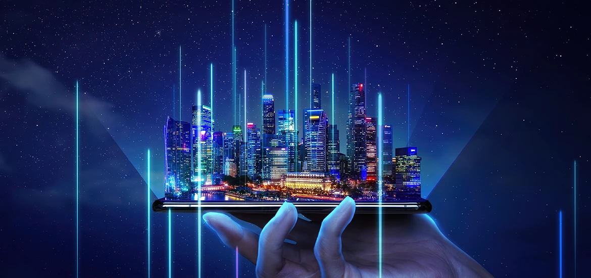 A futuristic city skyline emerges from a smartphone held in a person's hand, with glowing blue data lines rising into the night sky. The scene symbolizes smart city innovation, digital transformation, and the convergence of technology and urban infrastructure.