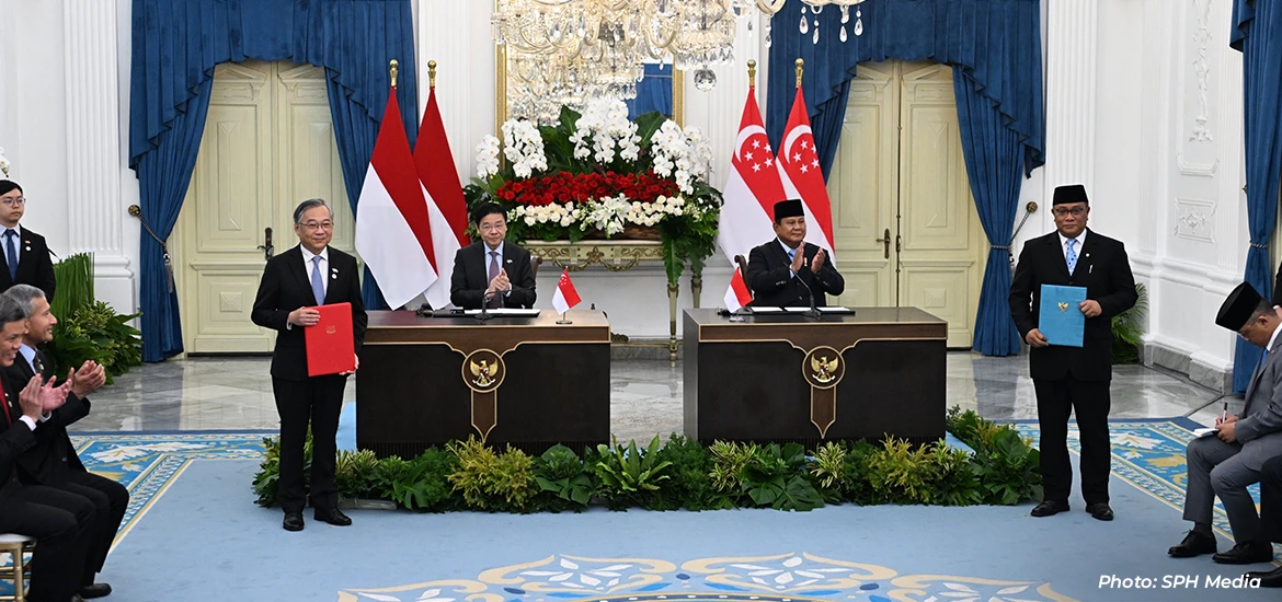 Prime Minister Lawrence Wong and Indonesian President Prabowo Subianto at the signing of a memorandum of understanding by Deputy Prime Minister and Minister for Trade and Industry Gan Kim Yong (left) and Indonesia’s Minister of Environment and head of the Environmental Control Agency, Mohammad Jumhur Hidayat.