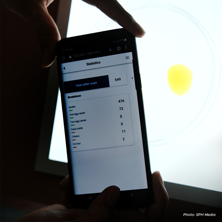 An employee can simply take a photo of a small pool of rotifers and upload it to a software, which will give a count in a minute.