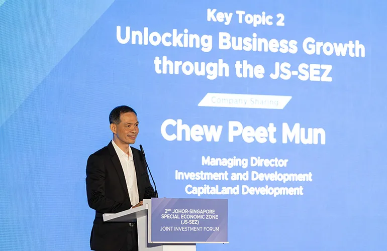 Mr Chew Peet Mun -  Managing Director of Investment and Development, giving a speech.