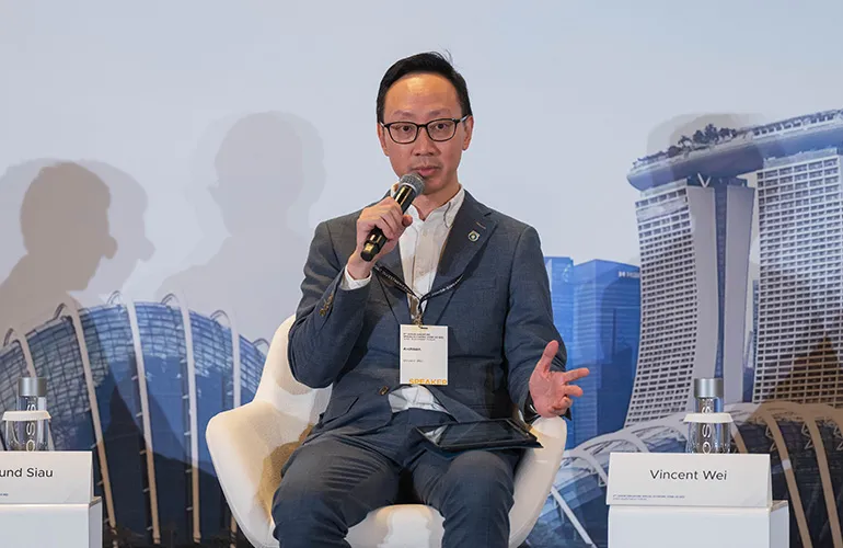 Mr Vincent Wei, CEO giving a speech.