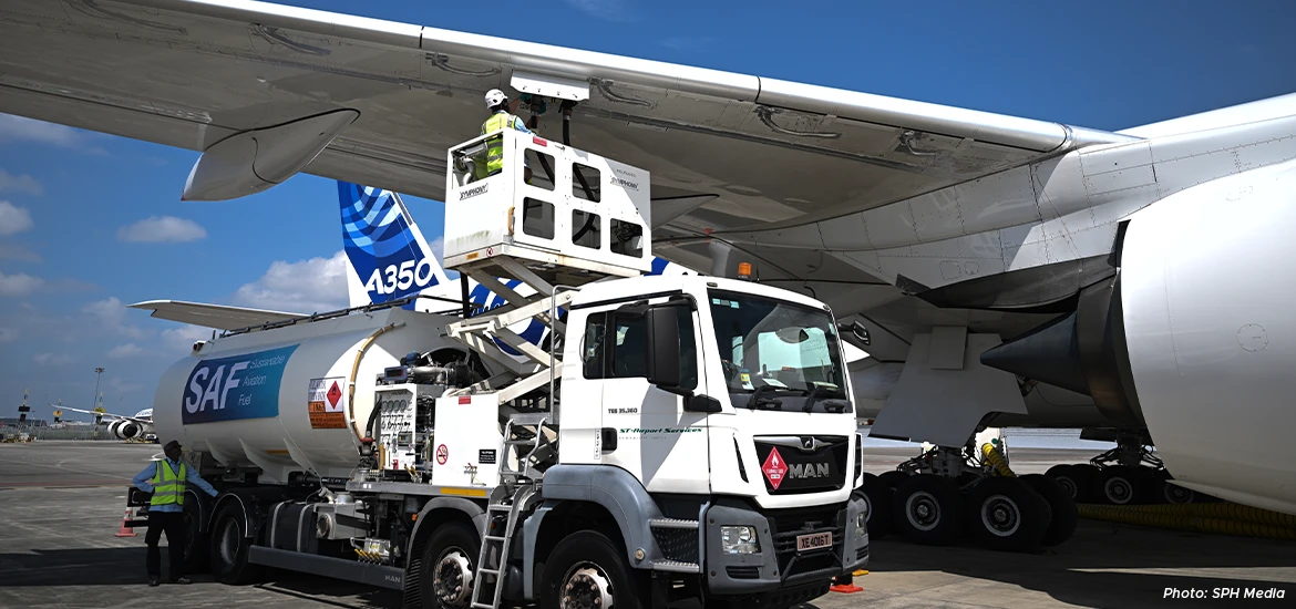 Refueling of an Airbus A350 aircraft with Sustainable Aviation Fuel (SAF) at an airport, symbolizing advancements in green aviation and sustainable energy solutions.