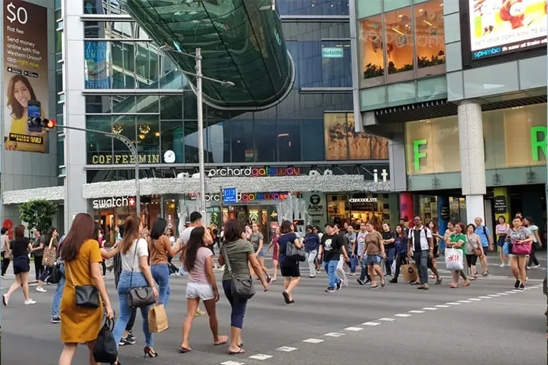  Stash away the suit jackets, lined trousers and boots. Breathable and functional wear is the daily norm in Singapore.