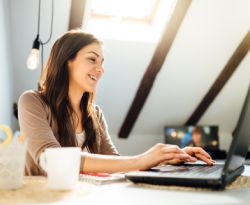 A lady using a laptop