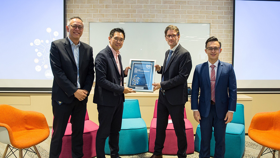 (L-R) Mr. Lim Kok Kiang, Asst-MD-EDB; Mr. Chng Kai Fong, MD, EDB; Dr. Andreas Hauser, Director, Digital Service, TÜV SÜD; Jackie-Tan, Senior-Consultant, TÜV SÜD at the launch of the Smart Industry Readiness Index.