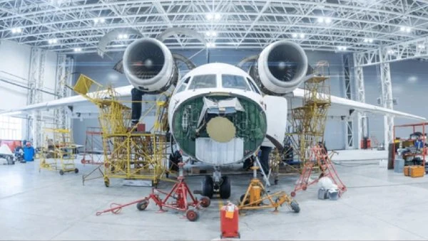 Aircraft undergoing maintenance in a hangar, representing leadership in the Maintenance, Repair, and Overhaul (MRO) market.