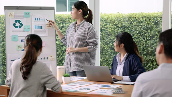 Scientist examining plant samples in test tubes, representing research excellence.