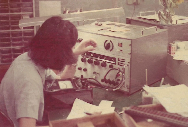 1975 lady operating the server.