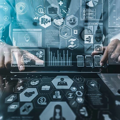 Hands operating a digital tablet with futuristic medical data and health analytics graphics overlaid, representing advanced healthcare technology and data-driven diagnostics.