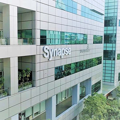 Modern office building with large glass windows.