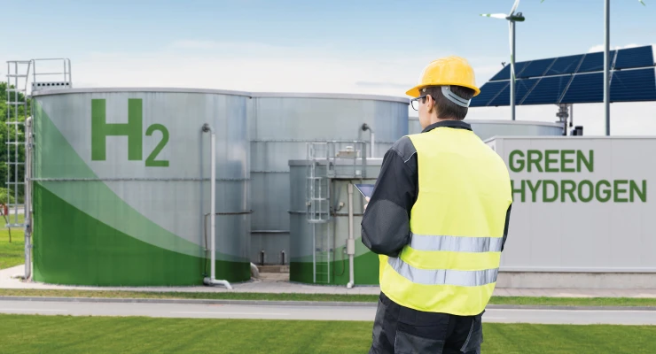 Image of person against H2 and Green Hydrogen background