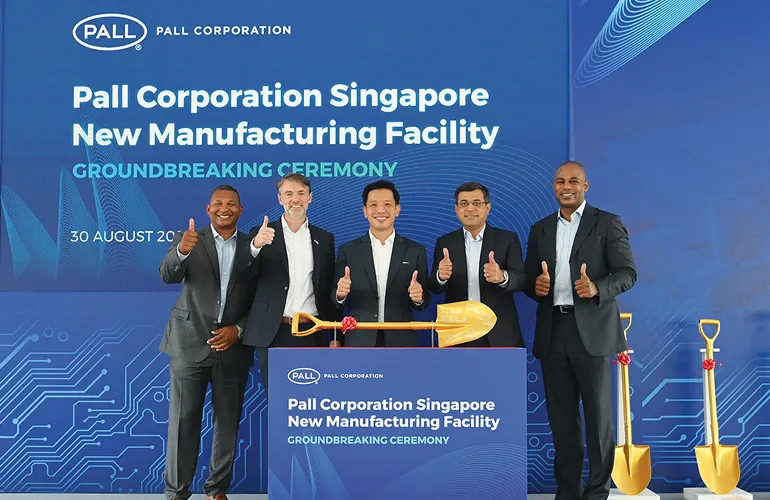 Business leaders at Pall Corporation’s Singapore groundbreaking ceremony, celebrating the launch of a new manufacturing facility.