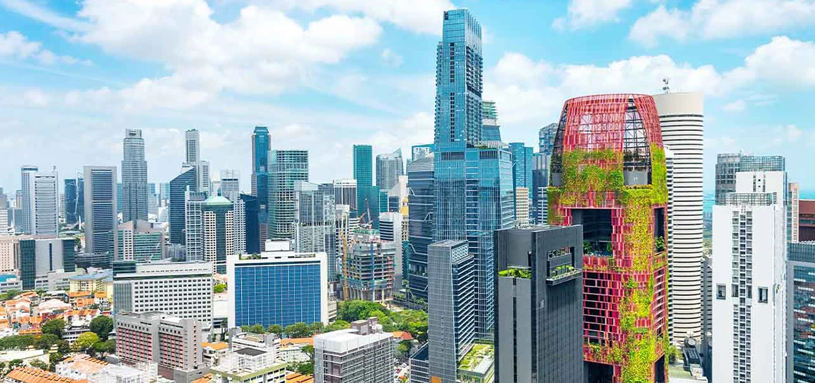 Singapore city skyline featuring modern high-rises and green architecture.