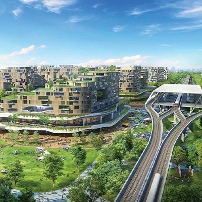 Futuristic eco-friendly residential complex with green rooftop terraces, lush park spaces, a pond, and an integrated train station surrounded by trees and modern infrastructure.